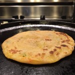Stuffed parata with boiled potatoes and carrots