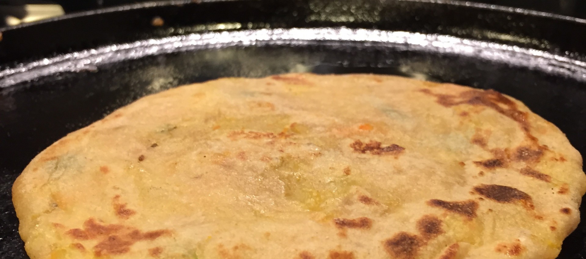 Stuffed parata with boiled potatoes and carrots